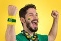 Brazilian supporter of National football team is celebrating, ch Royalty Free Stock Photo