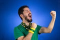 Brazilian supporter of National football team is celebrating, ch Royalty Free Stock Photo