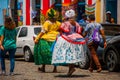 Brazilian woman of African descent, smiling, dressed in traditional Baiana attire in Pelourinho, Salvador, Brazil Royalty Free Stock Photo