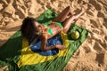 Brazilian Woman in Bikini Relaxing at the Beach Royalty Free Stock Photo