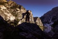 Brazilian woman watching at sunset the clear waters of Lake Braies Royalty Free Stock Photo