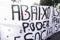 Brazilians protest with banners and posters with words against the government of President Jair Bolsonaro