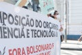 Brazilians protest with banners and posters with words against the government of President Jair Bolsonaro