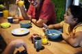 Brazillian family having breakfast together