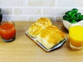 Bread with bacon ham pork mayonnaise and fruit juice Royalty Free Stock Photo