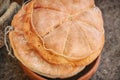 The bread baked at the retro technology of ancient Rome. Reconstruction of cooking in the ancient era. Roman bread, reconstruction Royalty Free Stock Photo