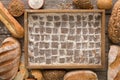 Bread bakery background. Brown and white wheat grain loaves, che Royalty Free Stock Photo