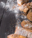 Bread bakery background. Brown and white wheat grain loaves composition Royalty Free Stock Photo