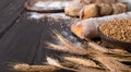 Bread bakery background. Brown and white wheat grain loaves composition Royalty Free Stock Photo