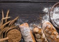 Bread bakery background. Brown and white wheat grain loaves composition Royalty Free Stock Photo