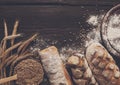 Bread bakery background. Brown and white wheat grain loaves composition Royalty Free Stock Photo