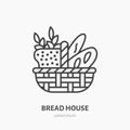 Bread basket with loaf, baguette and ears of wheat. Bakery