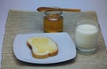 bread, butter, honey and milk Royalty Free Stock Photo