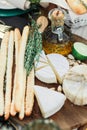 bread, cheese and olive oil on italian picnic Royalty Free Stock Photo