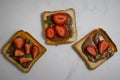 Bread with chocolate  , brown  rustic strawberries on a light background Royalty Free Stock Photo