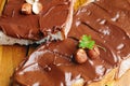 Bread with chocolate cream and hazelnuts on table closeup top Royalty Free Stock Photo