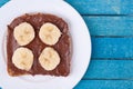Bread with chocolate spread and banana Royalty Free Stock Photo