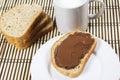 Bread with chocolate spread milk and hazelnuts Royalty Free Stock Photo