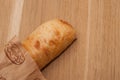 Italian bread of ciabatta on a wooden board, top view Royalty Free Stock Photo