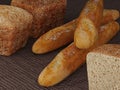 Bread closeup composition traditional baguette and loaf bakery product