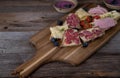 Bread with cold cuts, cheese and yogurt on wooden cutting board Royalty Free Stock Photo