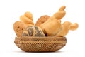 Bread composition of various rolls in a basket on white Royalty Free Stock Photo