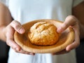 Bread cooking in betel palm leaf dish plate ware green pure organic nature natural waman hand holding selected focus