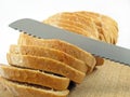 Bread cut and knife Royalty Free Stock Photo