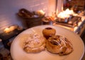 Bread, Danish breakfast buns on white plate, selective focus