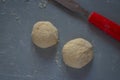 Bread dough  on floured board  with pallet knife.,making bread rolls at home.. hobby Royalty Free Stock Photo