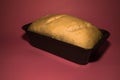 The bread dough is ready for baking. Homemade yeast bread from white flour in a square baking dish. World homemade food Royalty Free Stock Photo