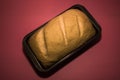 The bread dough has risen and ready for baking. Homemade yeast bread from white flour in a square baking dish. Royalty Free Stock Photo