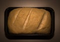 The bread dough has risen and ready for baking. Homemade yeast bread from white flour in a square baking dish. Royalty Free Stock Photo