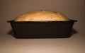 The bread dough is ready for baking. Homemade yeast bread from white flour in a square baking dish. World homemade food Royalty Free Stock Photo