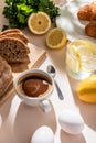 Bread, eggs, lemon water and cup Royalty Free Stock Photo