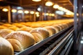 Bread fabrication: modern machinery on a production line in an automated bakehouse