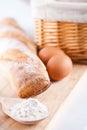 Bread, flour, eggs and kitchen utensil Royalty Free Stock Photo