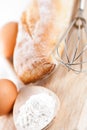 Bread, flour, eggs and kitchen utensil Royalty Free Stock Photo