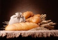 Bread, flour sack and ears bunch still life