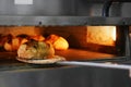 Bread freshly made. Out of a traditional brick oven. process of making bread Royalty Free Stock Photo