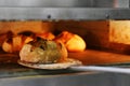 Bread freshly made. Out of a traditional brick oven. process of making bread Royalty Free Stock Photo