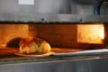 Bread freshly made. Out of a traditional brick oven. process of making bread Royalty Free Stock Photo