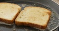 The bread is fried in butter or oil in a frying pan. Royalty Free Stock Photo