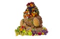 bread and fruit are piled up in a pyramid shape Royalty Free Stock Photo