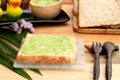 Bread with green custard and fresh milk. Royalty Free Stock Photo