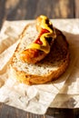 Bread with grilled sausage and mustard. German cuisine