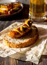 Bread with grilled sausage and mustard. German cuisine