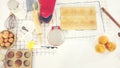 Bread in kitchen, Baking ingredients placed on wooden table, ready for cooking. Copyspace for text. Concept of food preparation, Royalty Free Stock Photo