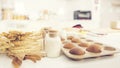 Bread in kitchen, Baking ingredients placed on wooden table, ready for cooking. Copyspace for text. Concept of food preparation, Royalty Free Stock Photo