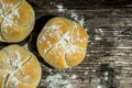 Bread loaf on a rustic wood . Free space for text.